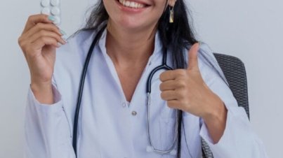 Doctor-Showing-Birth-Control-Pills