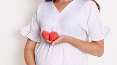 Pregnant-Women-In-White-Dress